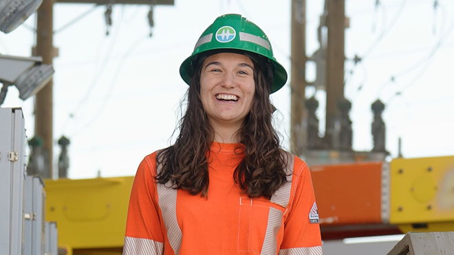 Natasha Hanson, a Try-a-Trade trainee, is all smiles in her safety gear