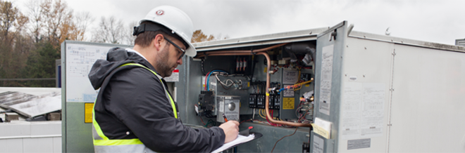 Electrical engineers working at Electrical Distribution Control Room.