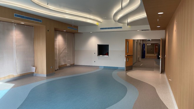 Hallway and elevators in construction at Mills Memorial Hospital