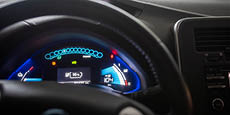 Close up of illuminated dashboard in electric car.