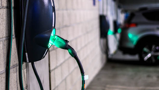 Power supply box in an electric vehicle charging station at a parking lot 